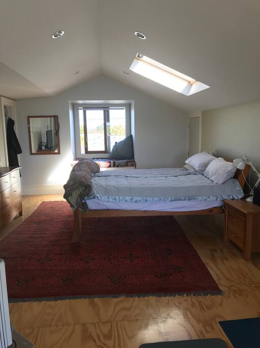 Upstairs room; window seat, king bed. (Our 8 year old sleeps in the window seat sometimes).