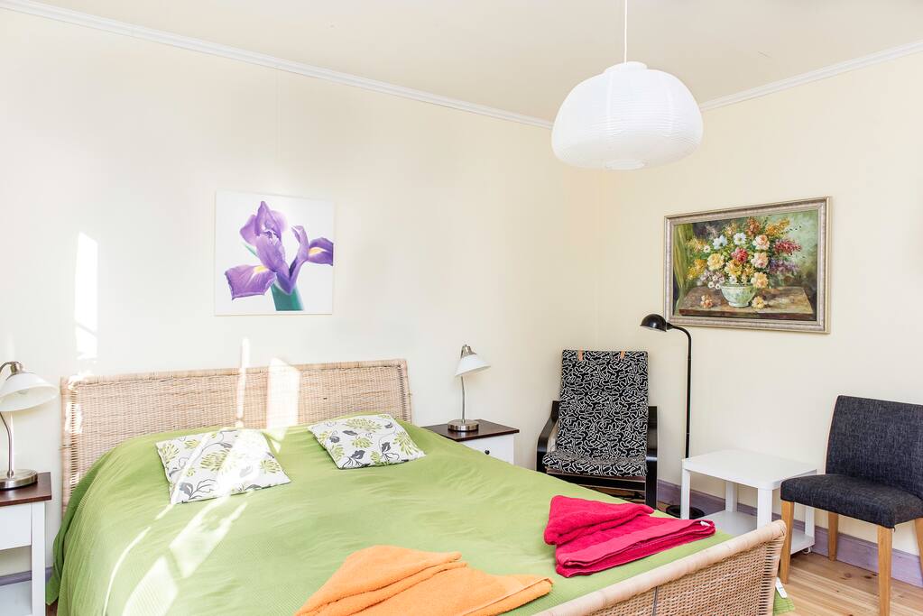 There are also wardrobes and a tv in the room.