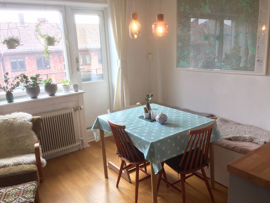 The dining table can double in size if you´re making a feast. You can even sunbathe inside when you open the balcony door :)
