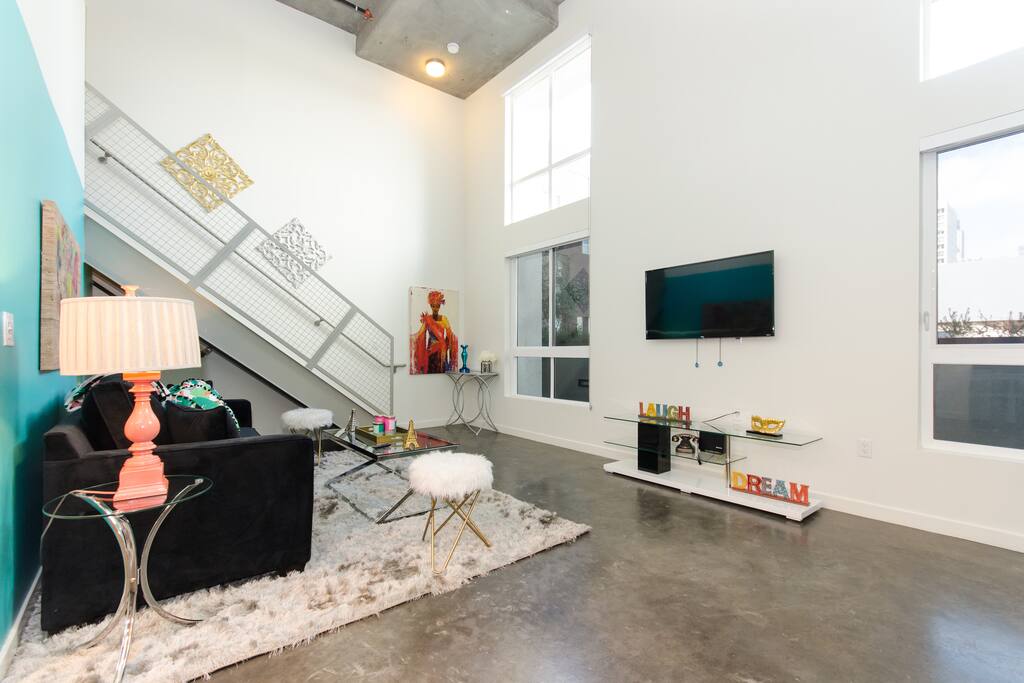 Large windows with beautiful natural light and the view of tall DTLA buildings right outside the windows
