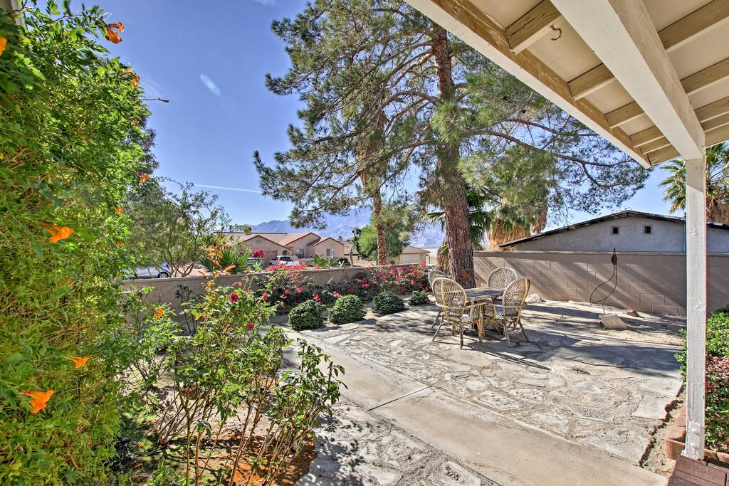 This beautiful property boasts a private backyard oasis with a pool and hot tub.