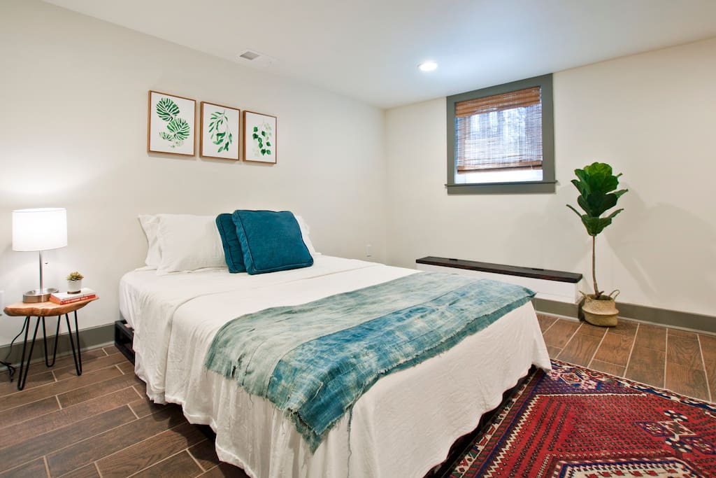 Bedroom with queen-size bed (lower level)