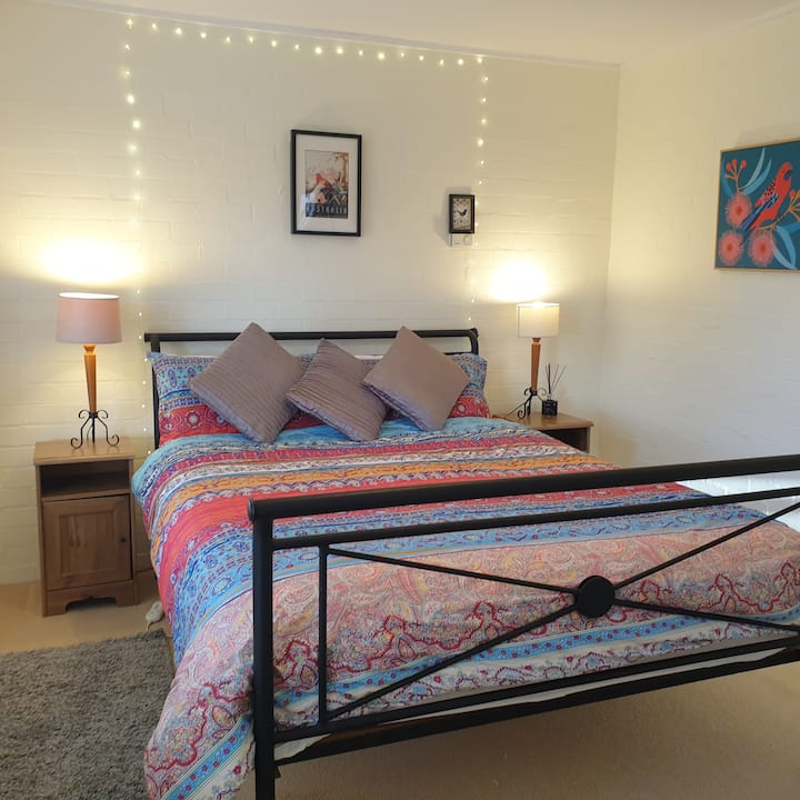 "Bird" QB bedroom with BIR. Full length mirror. Space for BYO cot. Each bedroom has electric blankets, portable heating and cooling fan.