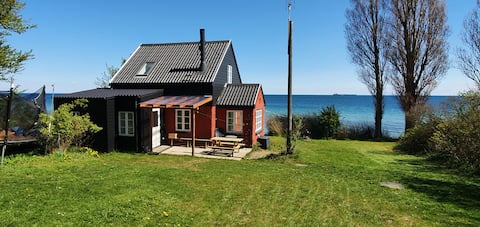 Idyllic cottage by the beach.