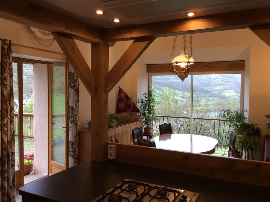 Spacious kitchen dining room with stunning views leading onto the terrace and garden