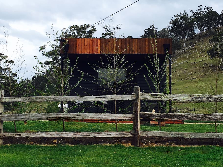 Private garden with post and rail fence