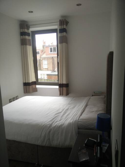 Bedroom with king size bed and two side tables