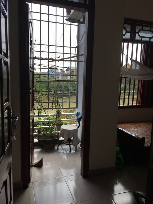 The window and balcony with the view to the lake- very fresh & cool