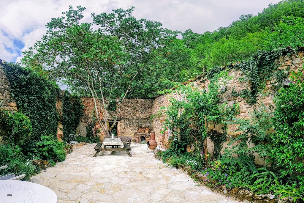 Guests have use of the walled garden, surrounded on three sides by water and a rushing weir