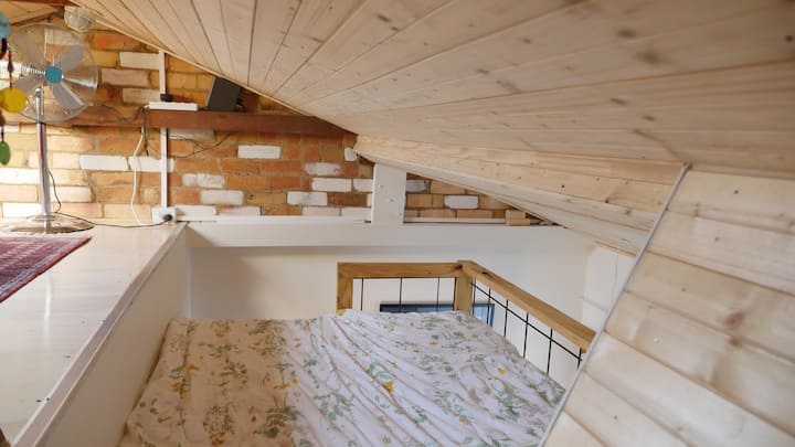 The bed in the loft