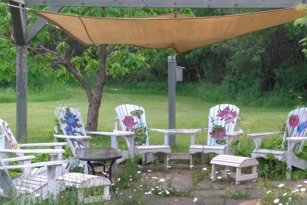 Grab a book or a drink and relax under the shade sails.