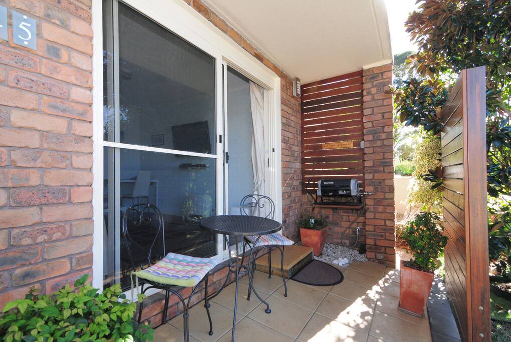 The outdoor area has a gas bar-b-que
and table and chairs to sit and relax