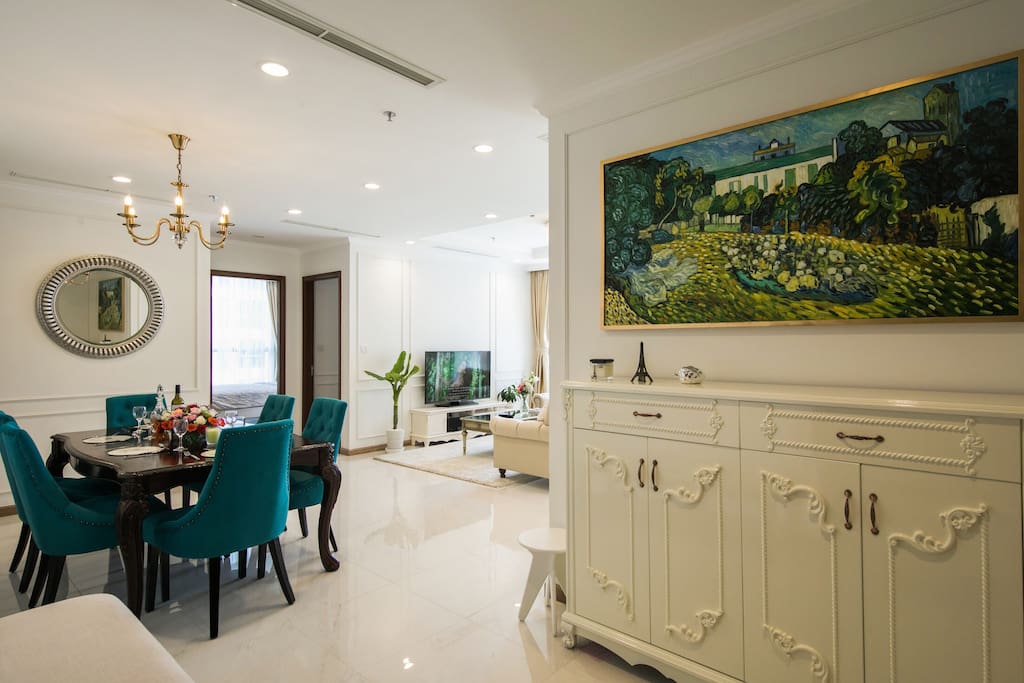 Main entrance: Greeted by Van Gogh's "Daubigny's castle" painting above a cream laced sideboard