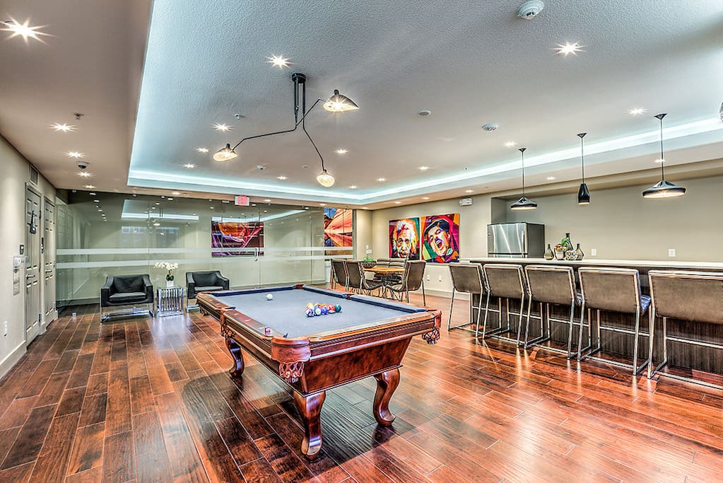 Pool table/lounge area right before you walk outside to the pool. In this room, there is coffee made every morning and it has 2 vending machines with snacks/medicine/beverages! (Open 24hrs)