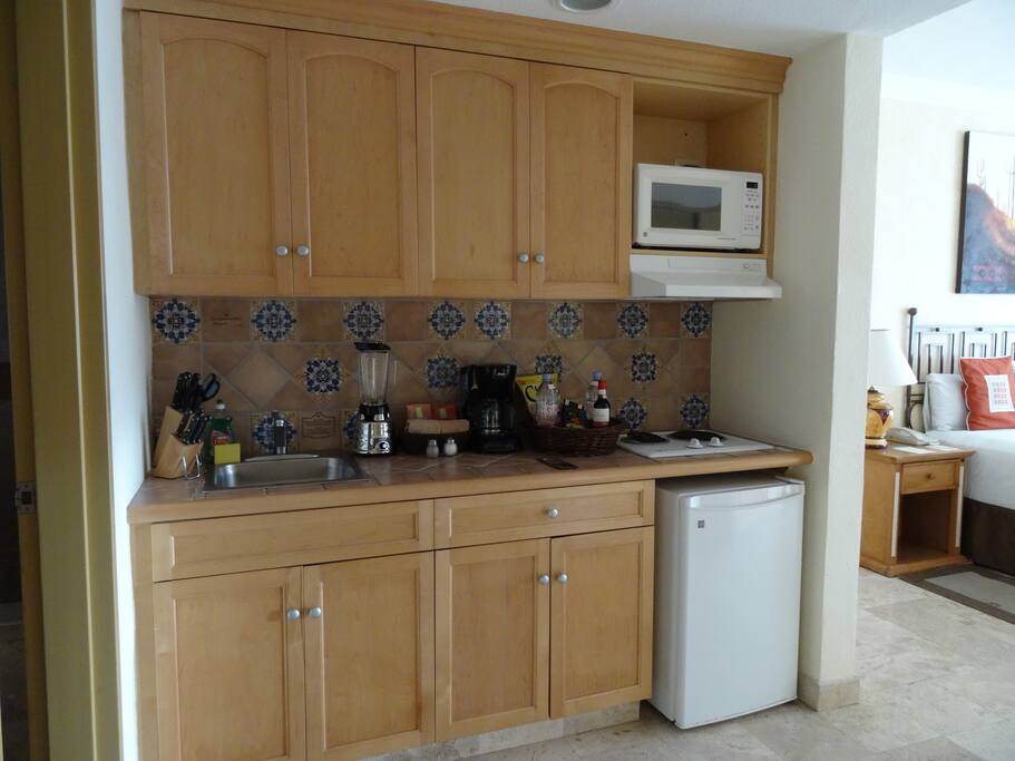 Kitchen complete with everything we've needed to make a meal. Outdoor dining on your private balcony.