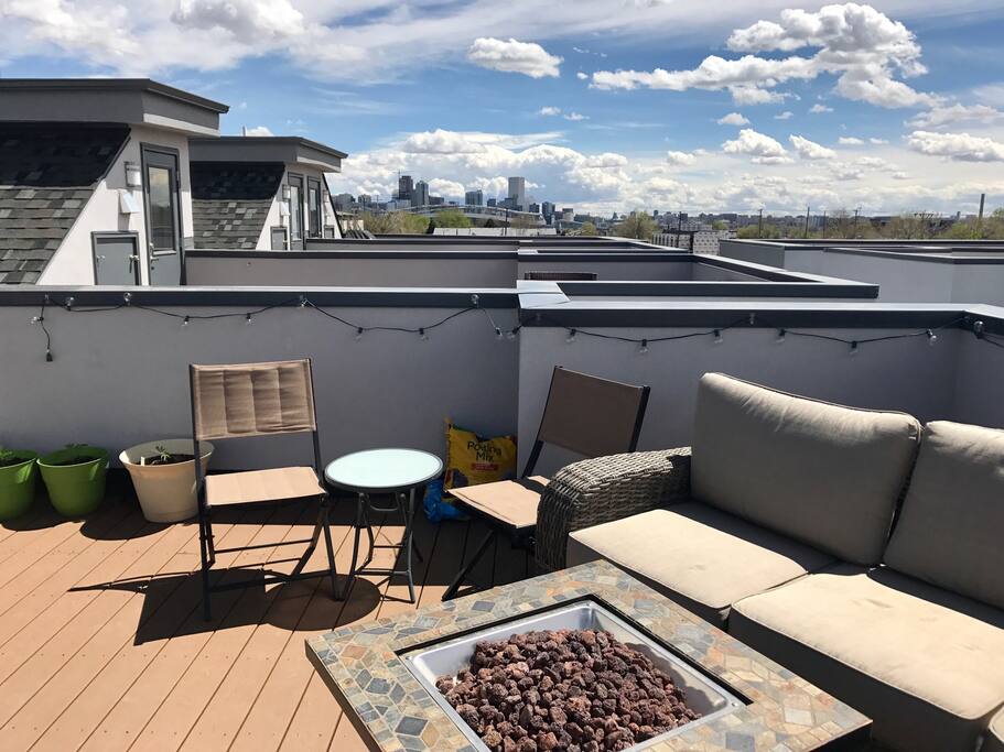 Fire pit and deck with mountain and city views