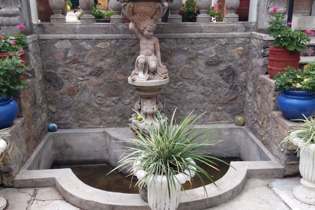 Fountain outside in front of the living room.