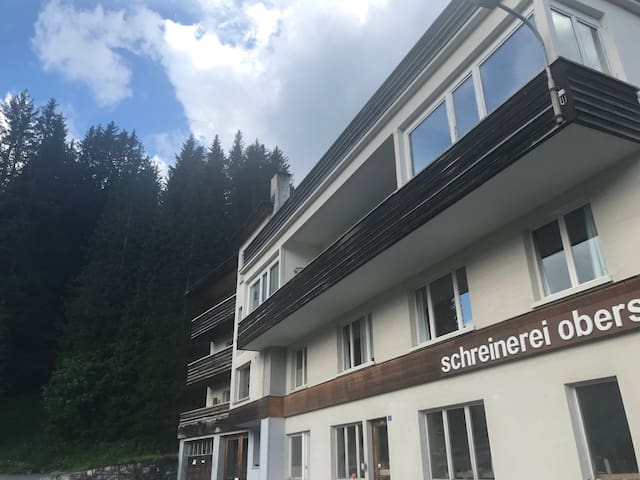 Apartment with lake view and forest behind the house