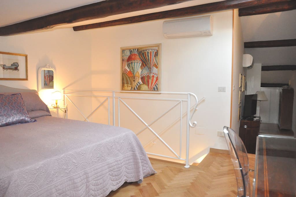 Bedroom - double bed, staircase railing, air conditioning split