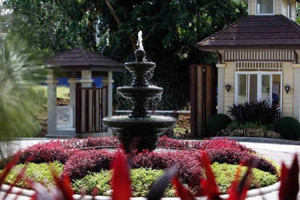 Main entrance gate with 24/7 security guard