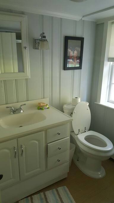 Full bathroom with stand up shower.