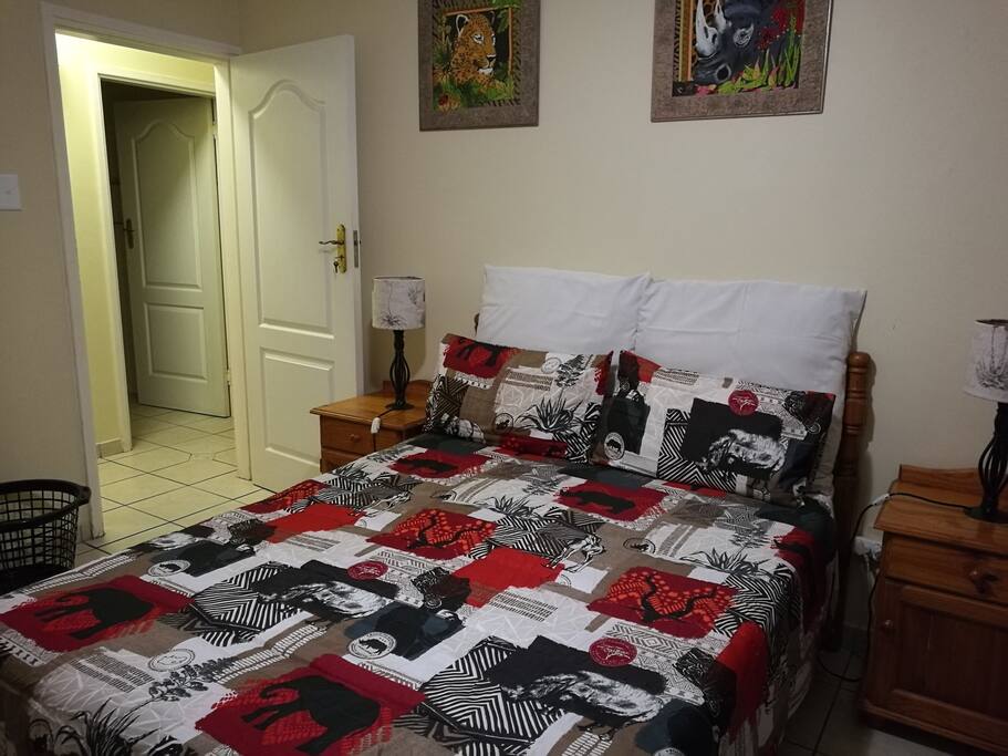 Bedroom close to separate bathroom and toilet.
