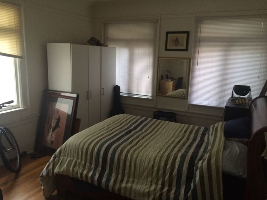 Huge room with corner desk and lots of light. Queen sized bed.