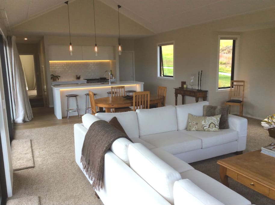 Fine furnishings in open-plan living area