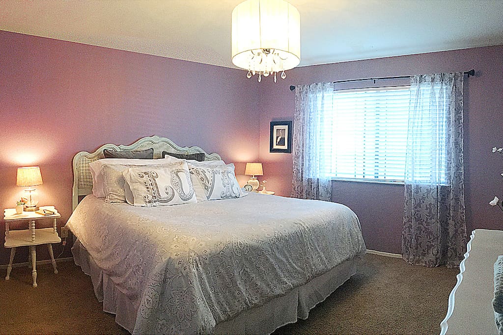 Your room at Rêves de Moutons. A comfortable king size bed with pasture views of the sheep and goats.