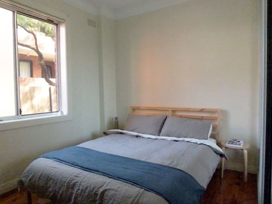 Perfectly lit bedroom with queen sized bed