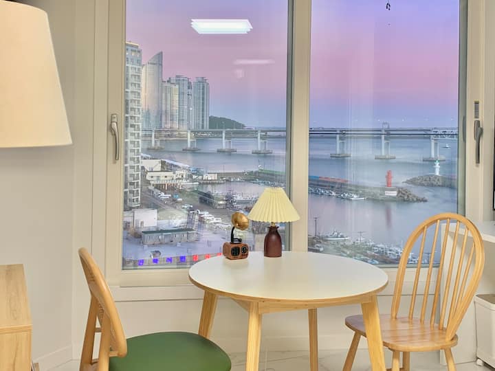 Cozy with wooden interior overlooking halfocean view