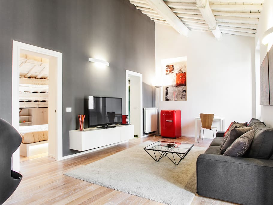 Living room 01: you can see the fridge, the espresso machine and the full HD tv