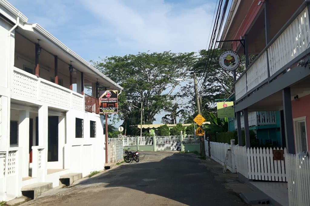 D's Guest House (left) located in front of popular restaurant (right)