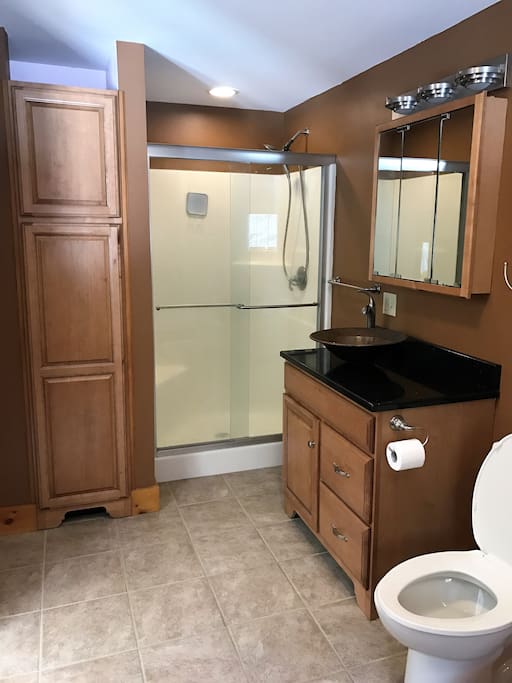 Bathroom has shower and Hot Tub.