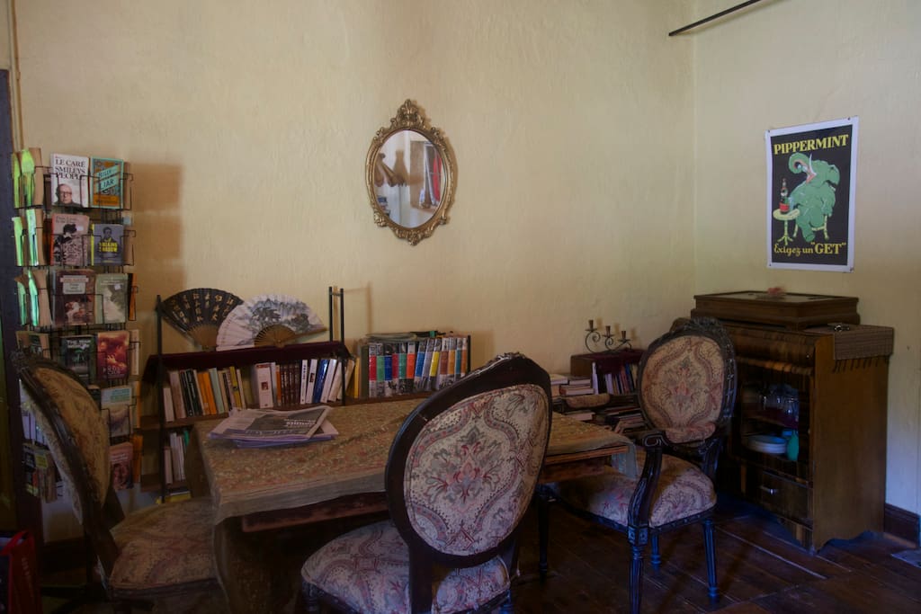 Main living room: dining table and lots of books!