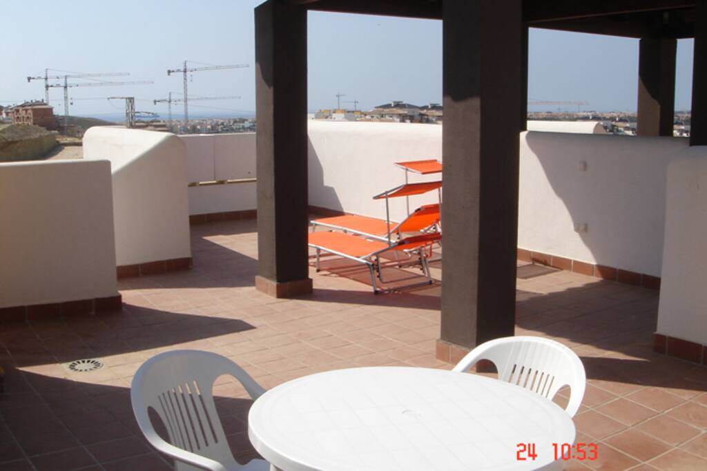 Solarium privado con pérgola