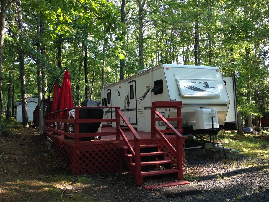 Front view of travel trailer, wider angle