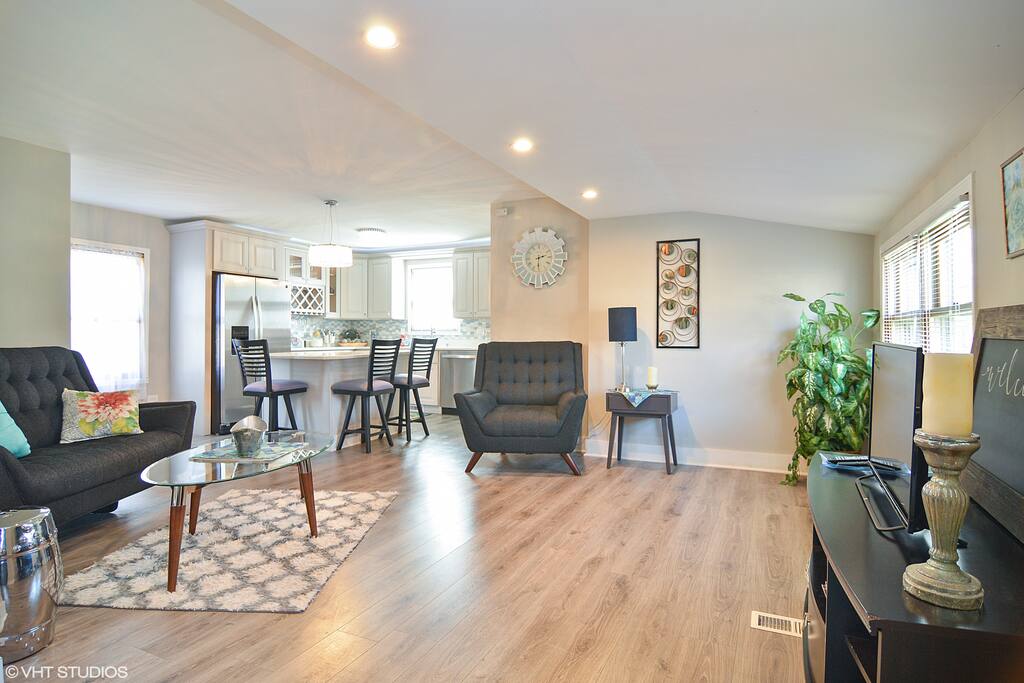 Beautiful open concept living room leads into kitchen