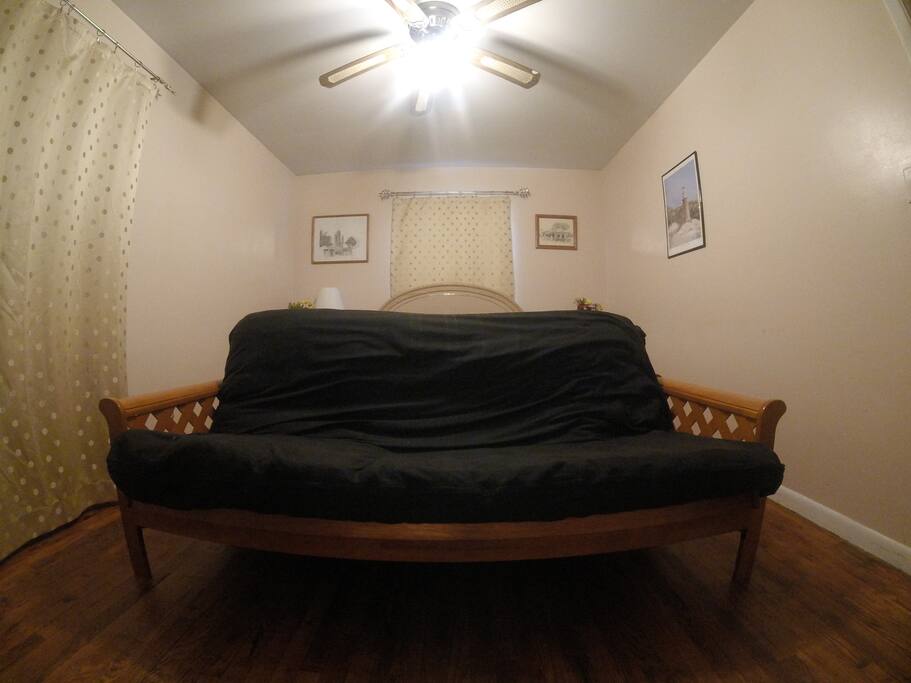 This Futon sofa folds out to become a bed.