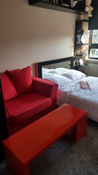 latest picture of room with new addition of red sofa and table !