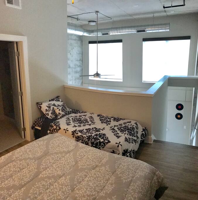 Queen bed and twin beds upstairs!! Sleeps 3 upstair comfortably!!