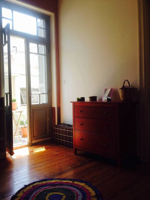 sunny double bed room with balcony