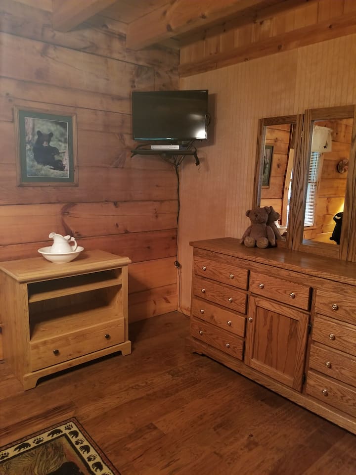 This 1st floor bedroom has a vanity and smart TV with Fire Stick for streaming your favorite shows.  