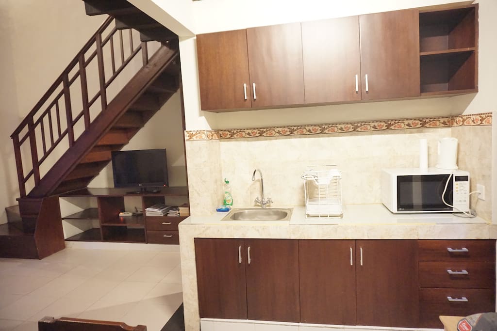 mini kitchen and cooking pacility.