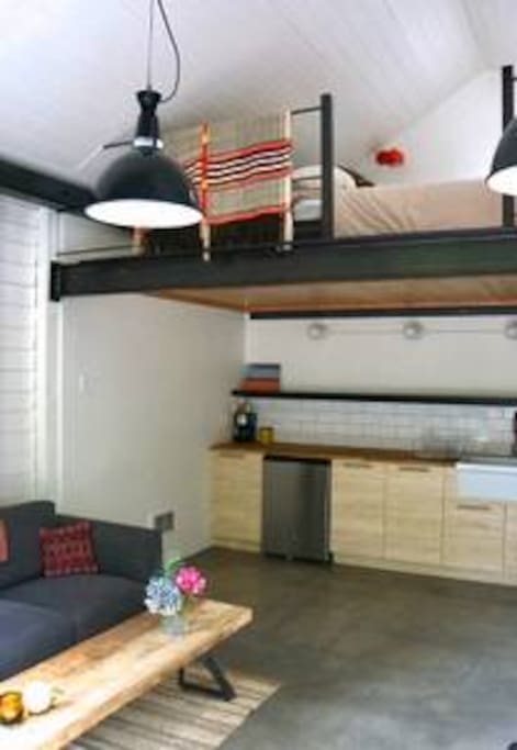 Architecturally designed studio with steel, wood and polished concrete floor