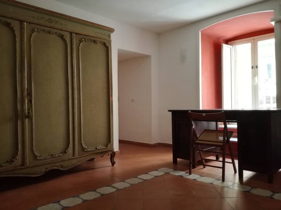 The bedroom with double bed and single bed