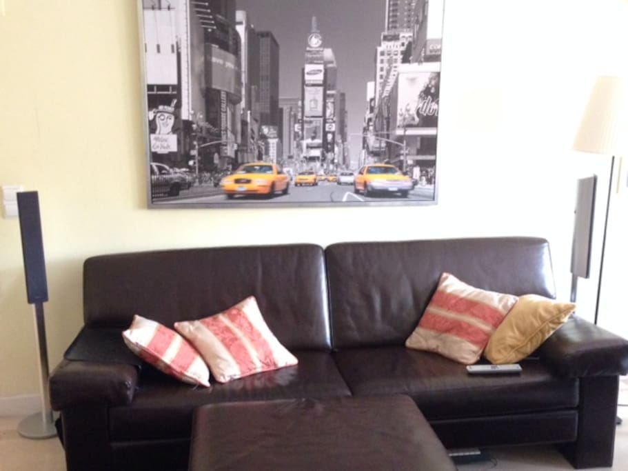 Large living room w/ comfy couch.