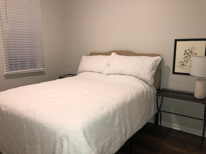 First bedroom has a queen size bed.