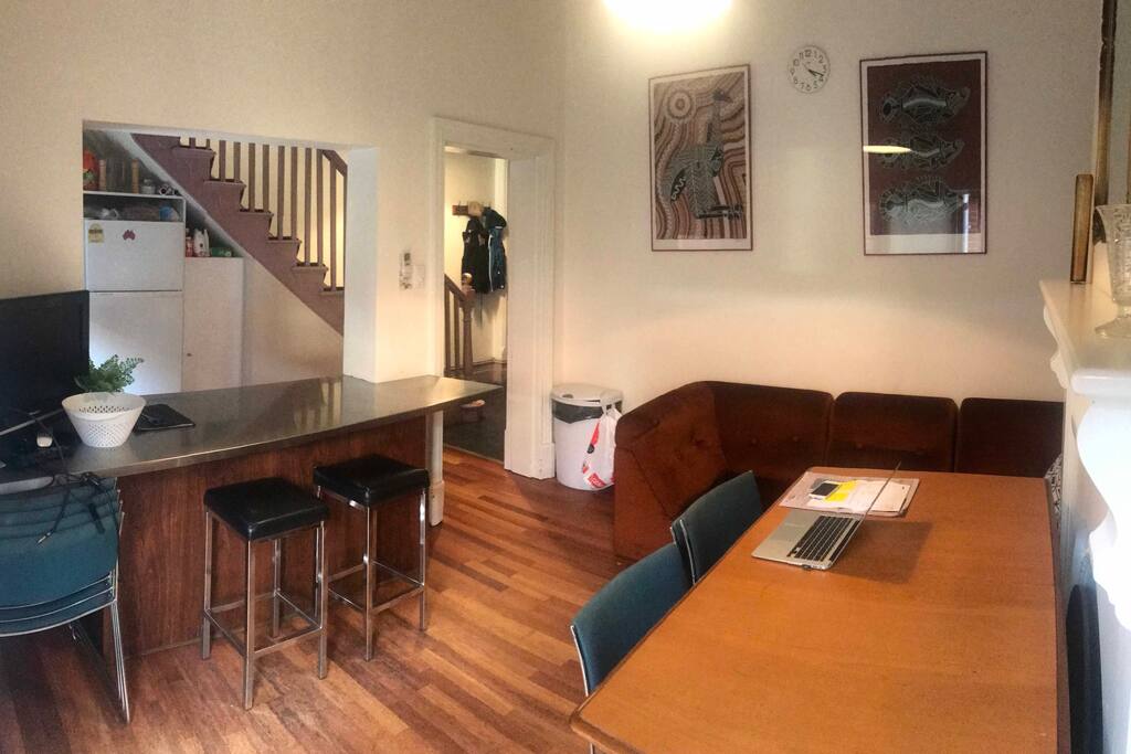 Living room with kitchen located downstairs