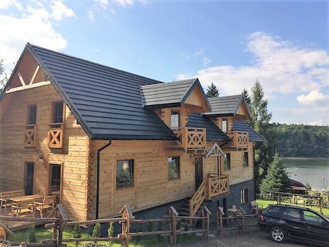 Log house by the lake in the Bieszczady Mountains - Solina